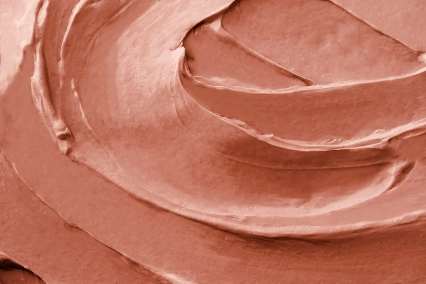 Nahaufnahme der Textur von pinkem Zuckerguss als Hintergrund